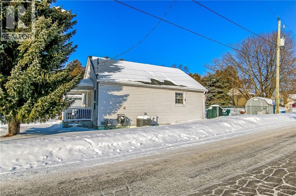 lot goes beyond the fence to the large tree - 13 Second Avenue E, Simcoe, ON - Outdoor