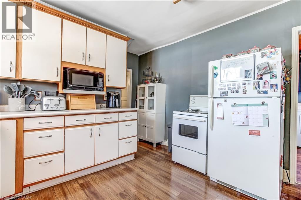 fridge and stove included - 13 Second Avenue E, Simcoe, ON - Indoor Photo Showing Kitchen