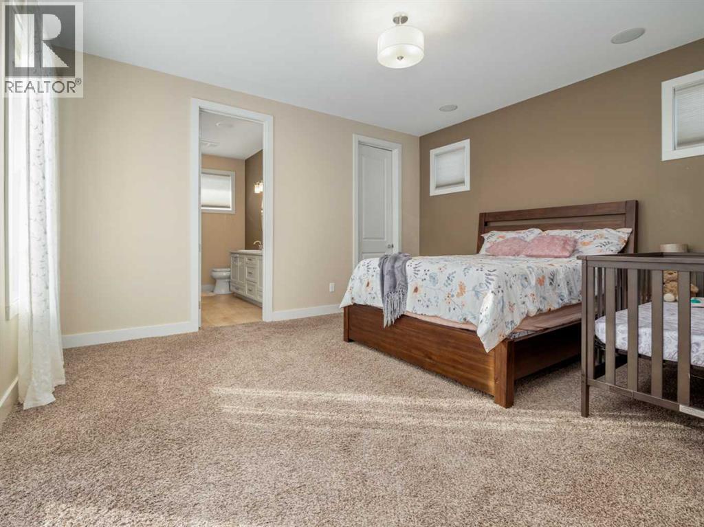 18 Northlander Road W, Lethbridge, AB - Indoor Photo Showing Bedroom