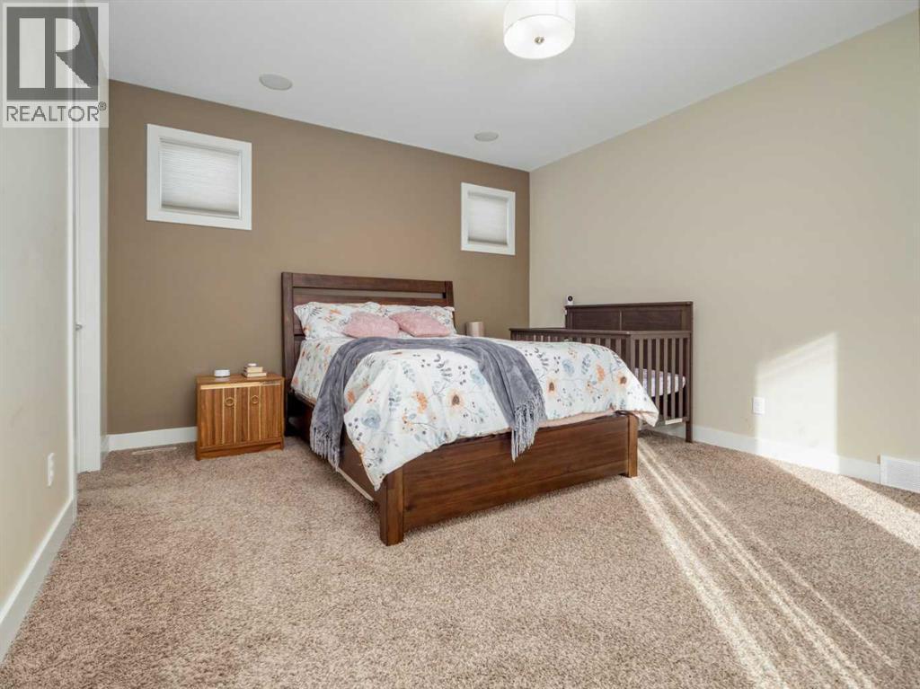 18 Northlander Road W, Lethbridge, AB - Indoor Photo Showing Bedroom