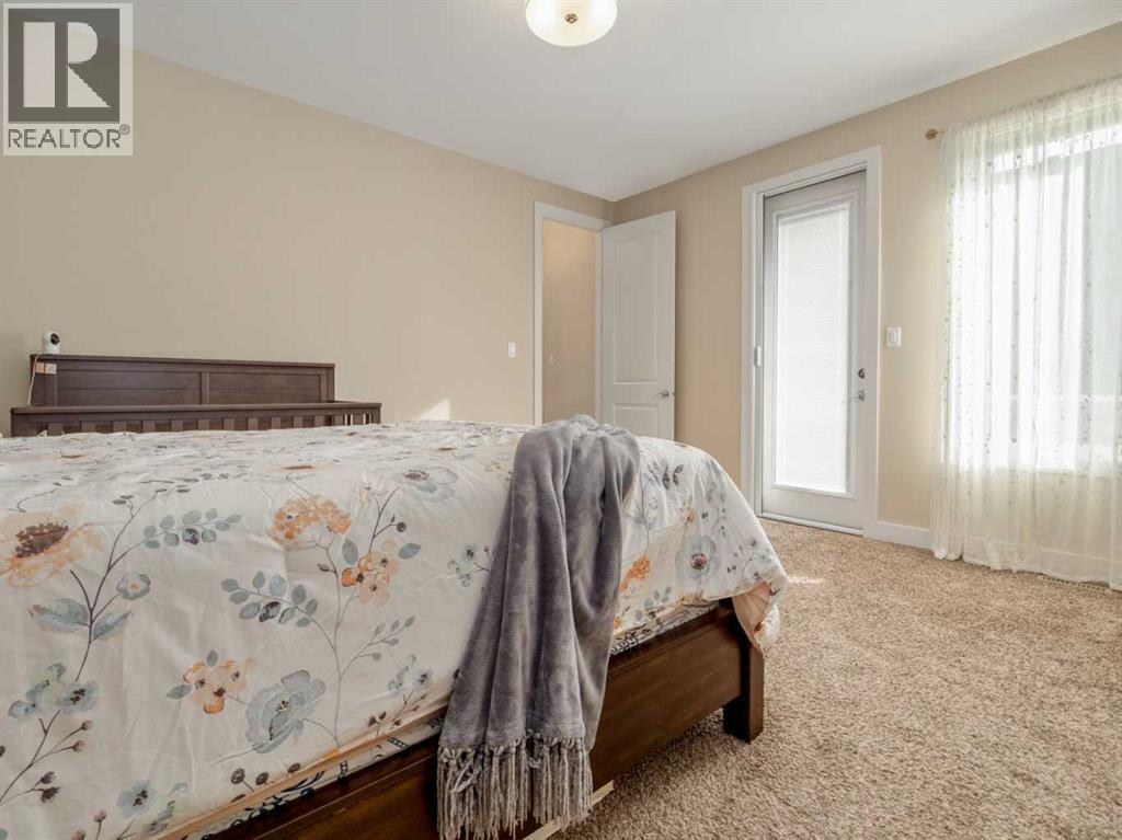 18 Northlander Road W, Lethbridge, AB - Indoor Photo Showing Bedroom