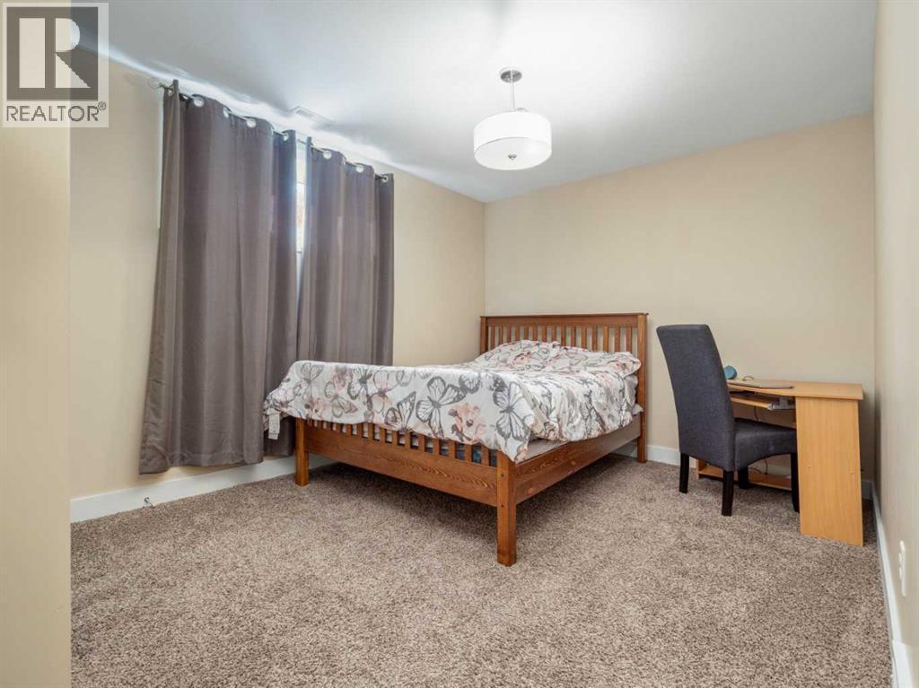 18 Northlander Road W, Lethbridge, AB - Indoor Photo Showing Bedroom