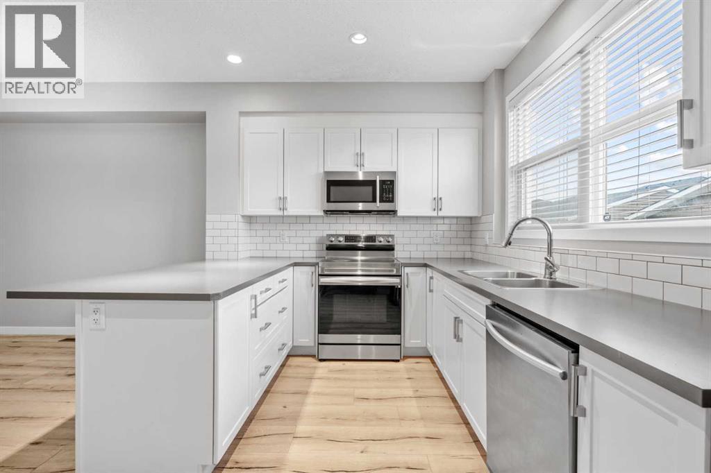 368 Redstone Drive Ne, Calgary, AB - Indoor Photo Showing Kitchen With Double Sink With Upgraded Kitchen