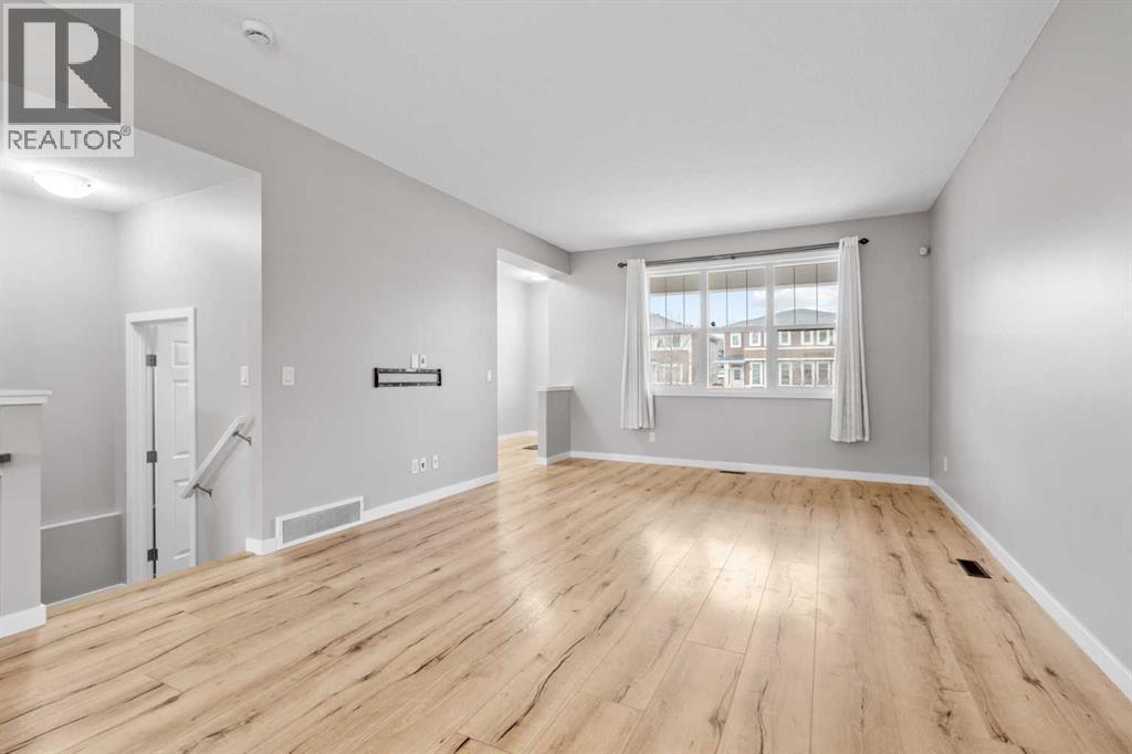 368 Redstone Drive Ne, Calgary, AB - Indoor Photo Showing Other Room With Fireplace
