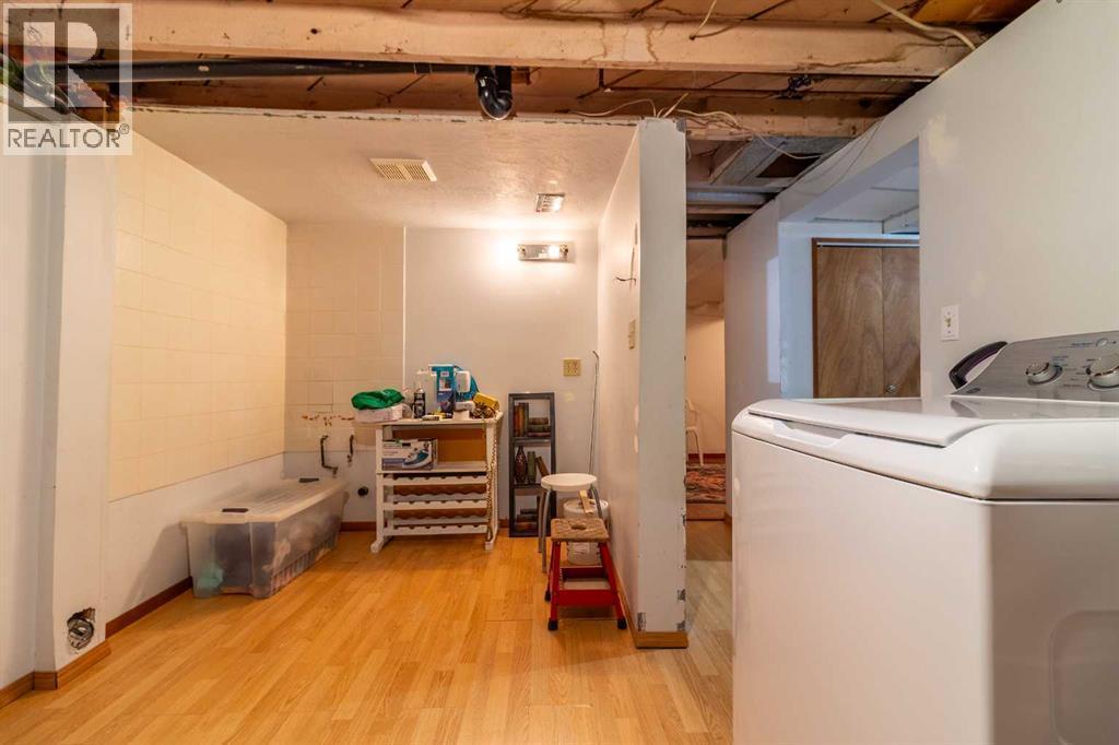 253 51 Avenue E, Claresholm, AB - Indoor Photo Showing Laundry Room