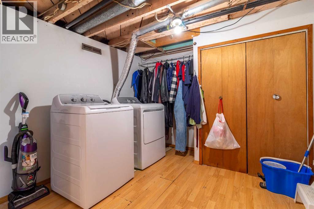 253 51 Avenue E, Claresholm, AB - Indoor Photo Showing Laundry Room