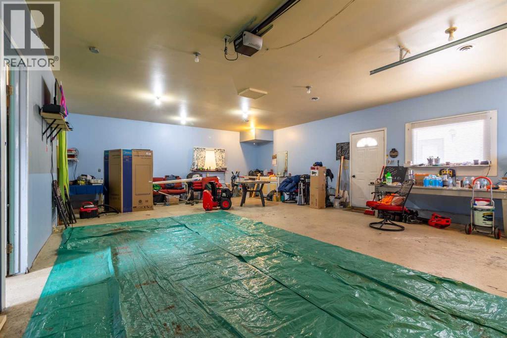 253 51 Avenue E, Claresholm, AB - Indoor Photo Showing Other Room With In Ground Pool