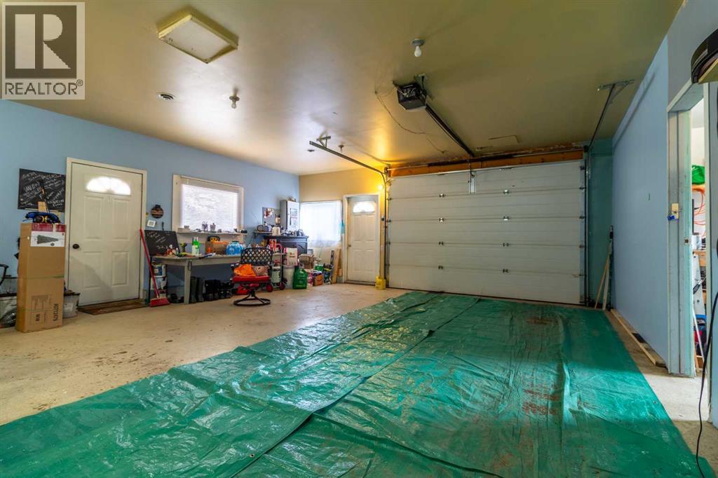 253 51 Avenue E, Claresholm, AB - Indoor Photo Showing Garage