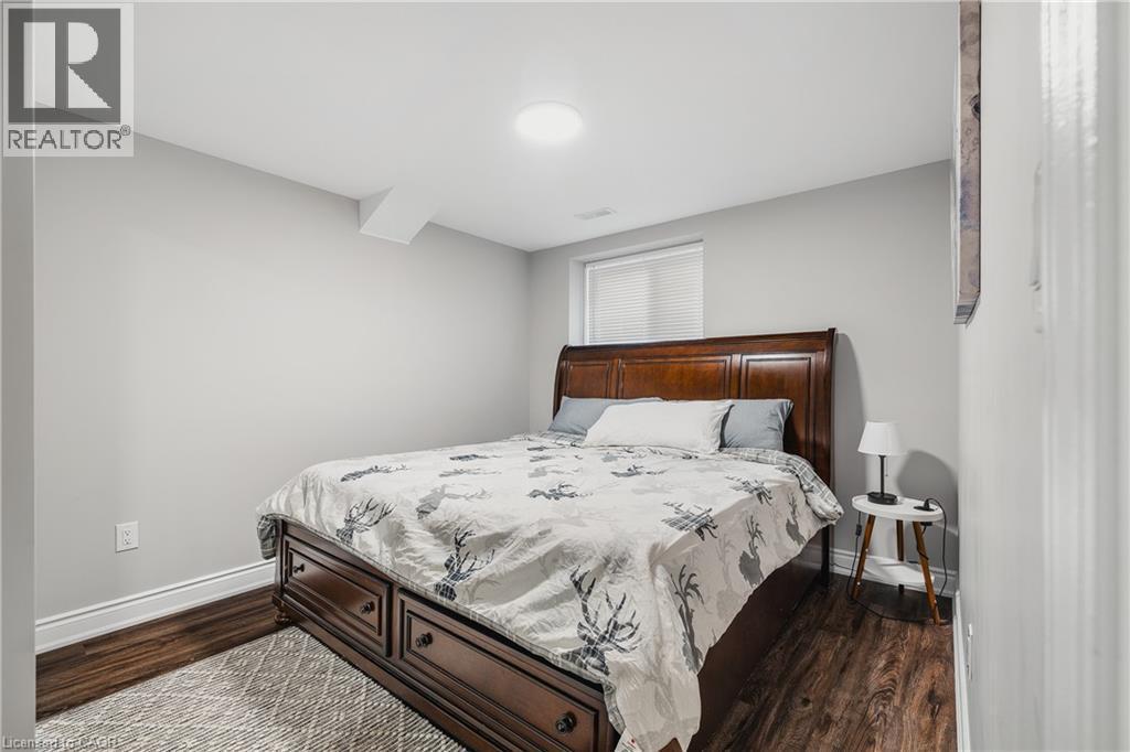 Bedroom with baseboards and dark wood finished floors - 346 Moorlands Crescent, Kitchener, ON - Indoor Photo Showing Bedroom