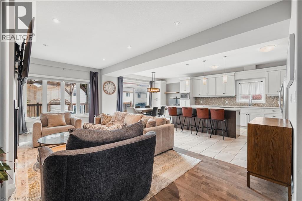 Living room featuring light wood-style floors and recessed lighting - 346 Moorlands Crescent, Kitchener, ON - Indoor Photo Showing Living Room