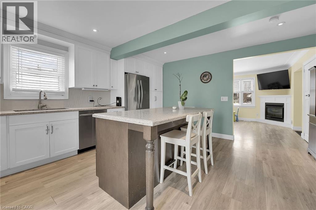 62 Knoll Street, Port Colborne, ON - Indoor Photo Showing Kitchen With Fireplace