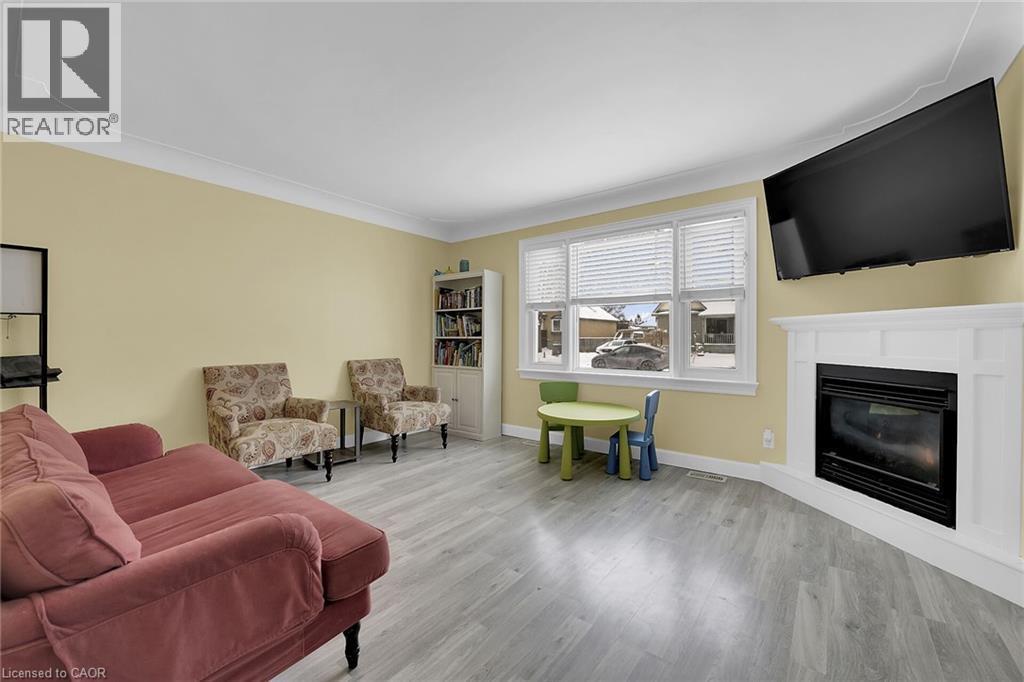 62 Knoll Street, Port Colborne, ON - Indoor Photo Showing Living Room With Fireplace