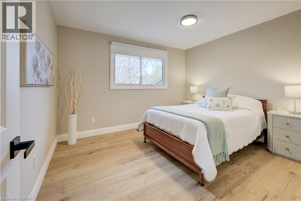 Bedroom with light wood-type flooring and baseboards - 279 Ferndale Place, Waterloo, ON - Indoor Photo Showing Bedroom