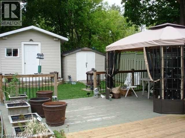 Wooden deck with a shed - 134 Courtland Avenue E, Kitchener, ON