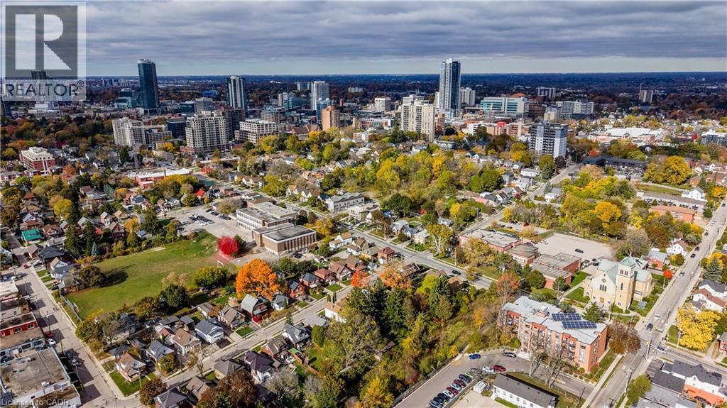 Aerial overview of property's location featuring nearby urban area - 138 Courtland Avenue E, Kitchener, ON