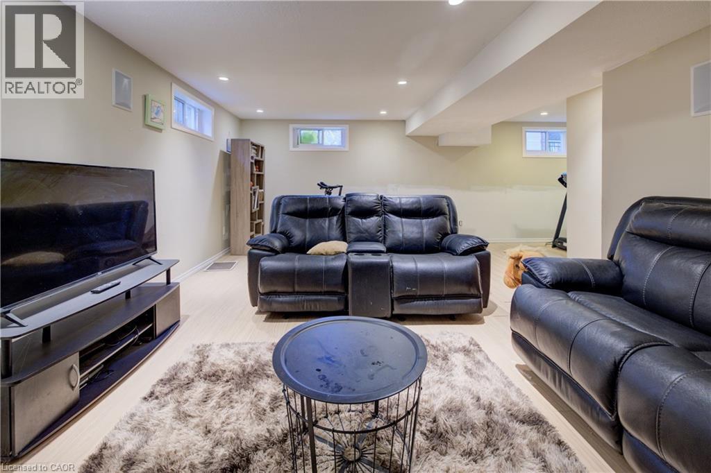Living room featuring recessed lighting and plenty of natural light - 31 Bonfair Court, Kitchener, ON - Indoor