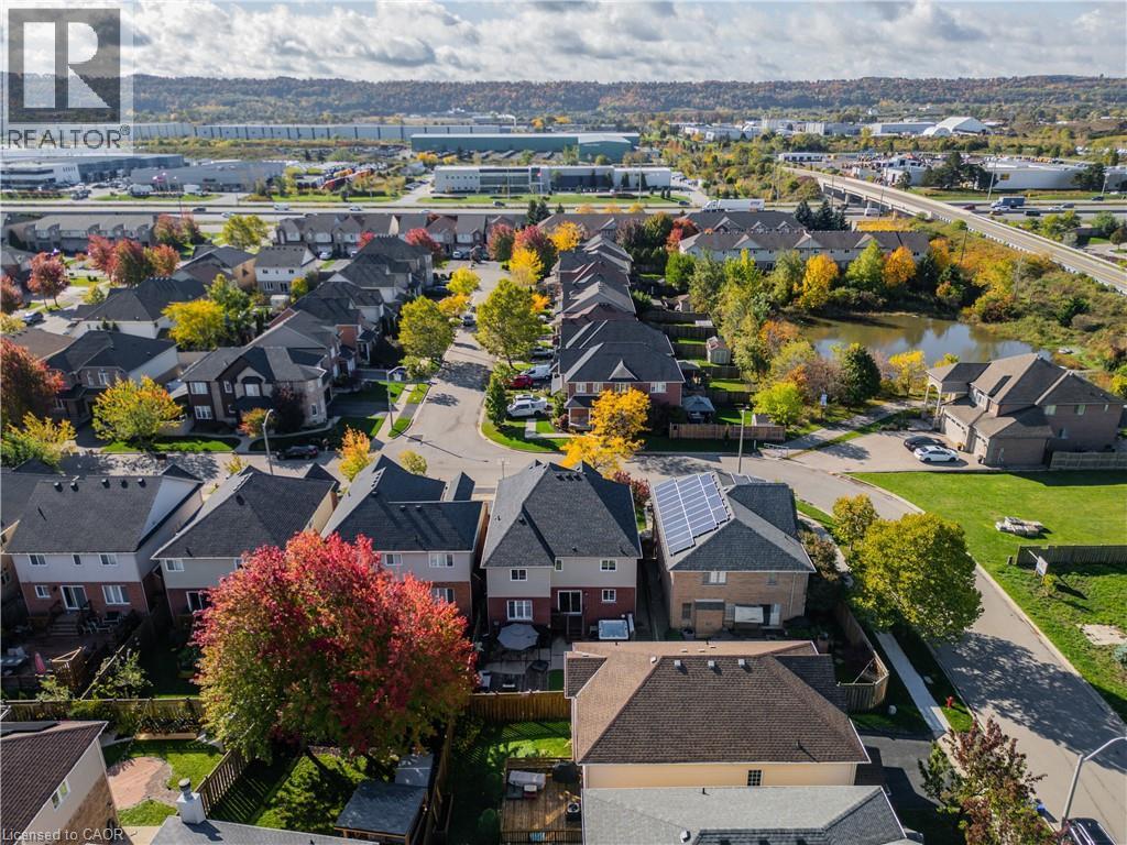 Aerial view of residential area with a nearby body of water - 28 Springbreeze Heights, Hamilton, ON - Outdoor With View