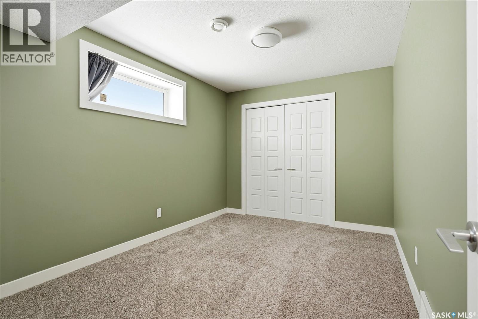 5669 Glide Crescent, Regina, SK - Indoor Photo Showing Other Room