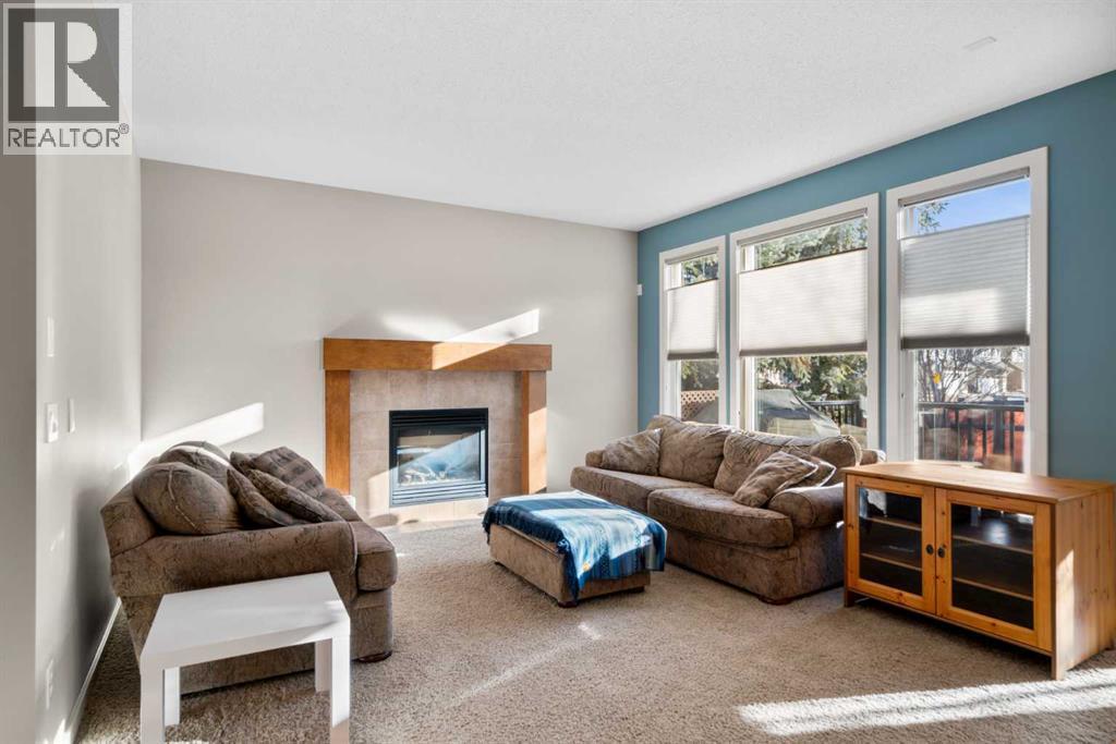 5 Mahogany Square Se, Calgary, AB - Indoor Photo Showing Living Room With Fireplace