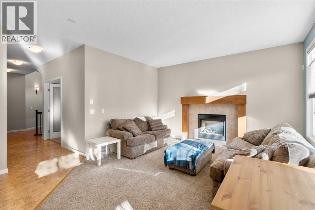 Nice Family Room - 5 Mahogany Square Se, Calgary, AB - Indoor Photo Showing Living Room With Fireplace