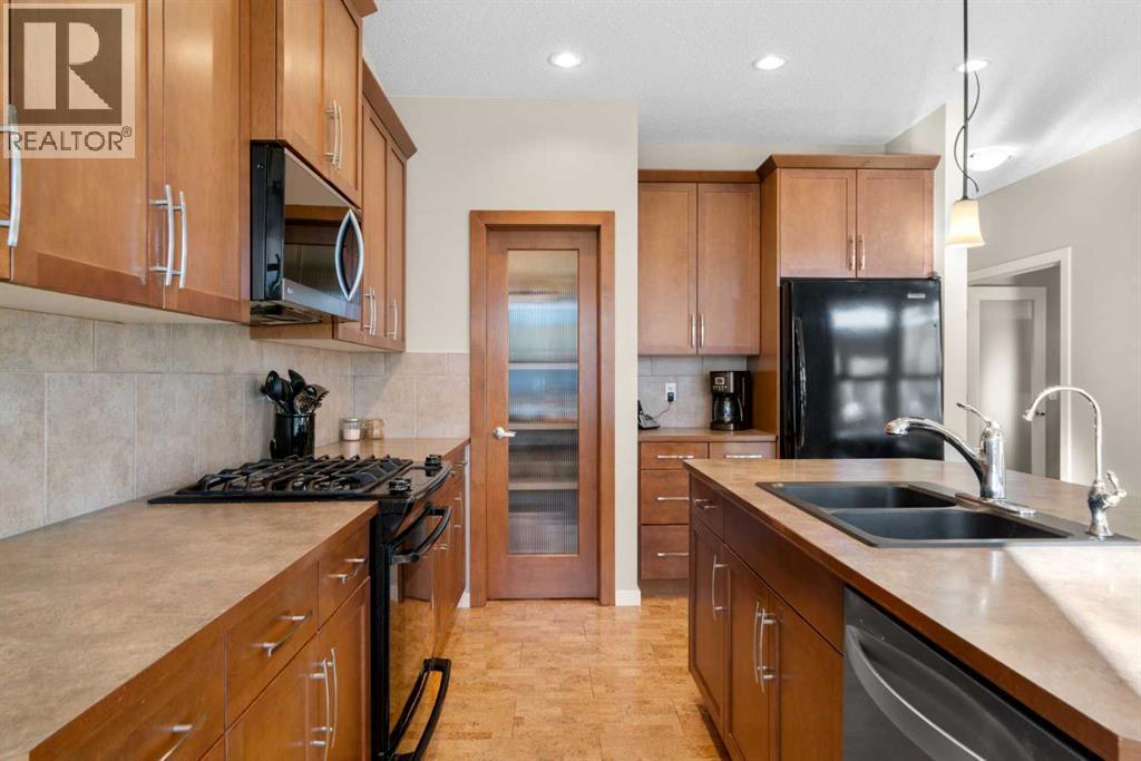 5 Mahogany Square Se, Calgary, AB - Indoor Photo Showing Kitchen With Double Sink