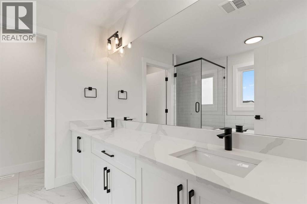 Picture is from a recent build by the builder with similar finishes and will be similar but not an exact match - 53 Heritage Park, Cochrane, AB - Indoor Photo Showing Bathroom
