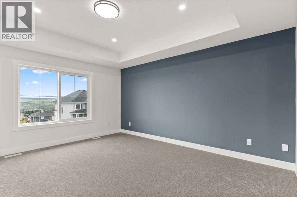 Picture is from a recent build by the builder with similar finishes and will be similar but not an exact match - 53 Heritage Park, Cochrane, AB - Indoor Photo Showing Other Room