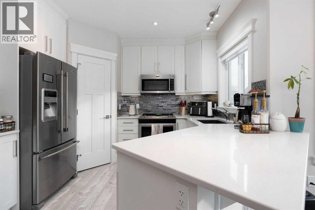 141 Pearson Drive, Fort Mcmurray, AB - Indoor Photo Showing Kitchen With Stainless Steel Kitchen With Upgraded Kitchen
