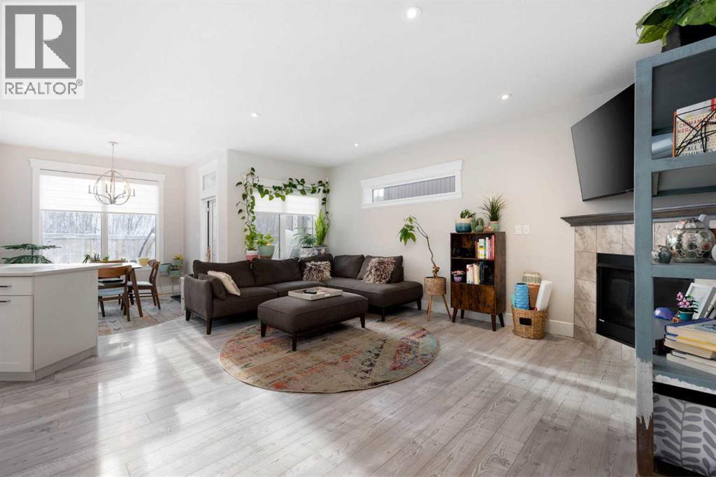 141 Pearson Drive, Fort Mcmurray, AB - Indoor Photo Showing Living Room With Fireplace