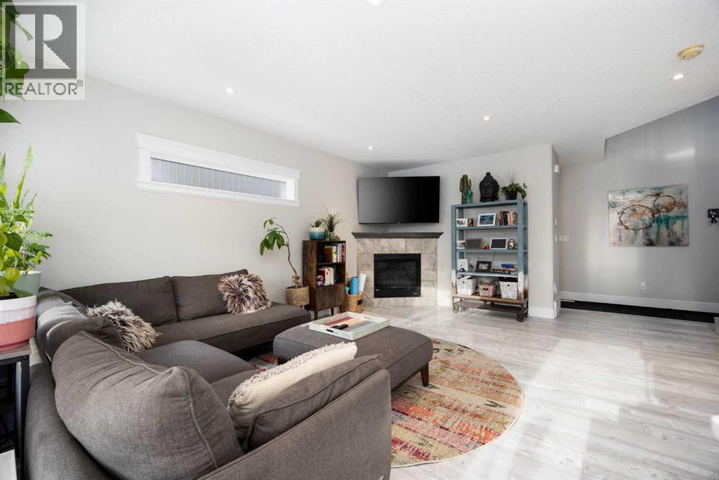 141 Pearson Drive, Fort Mcmurray, AB - Indoor Photo Showing Living Room With Fireplace