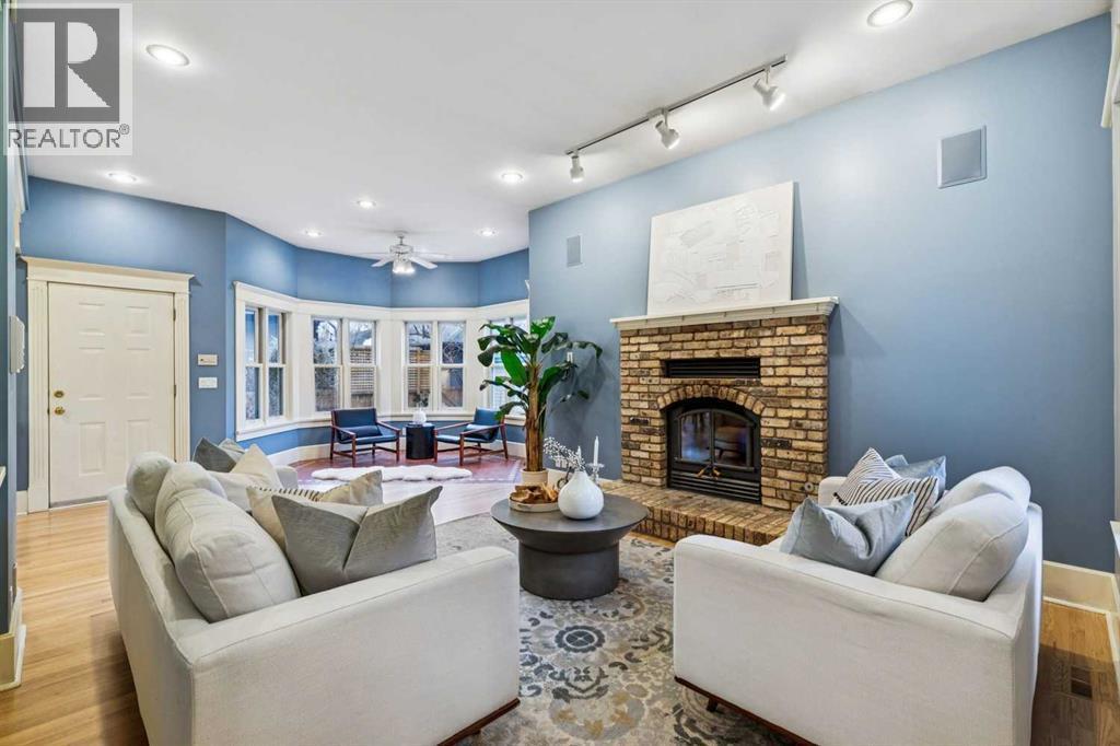 3019 6 Street Sw, Calgary, AB - Indoor Photo Showing Living Room With Fireplace