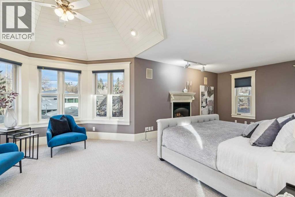3019 6 Street Sw, Calgary, AB - Indoor Photo Showing Bedroom With Fireplace