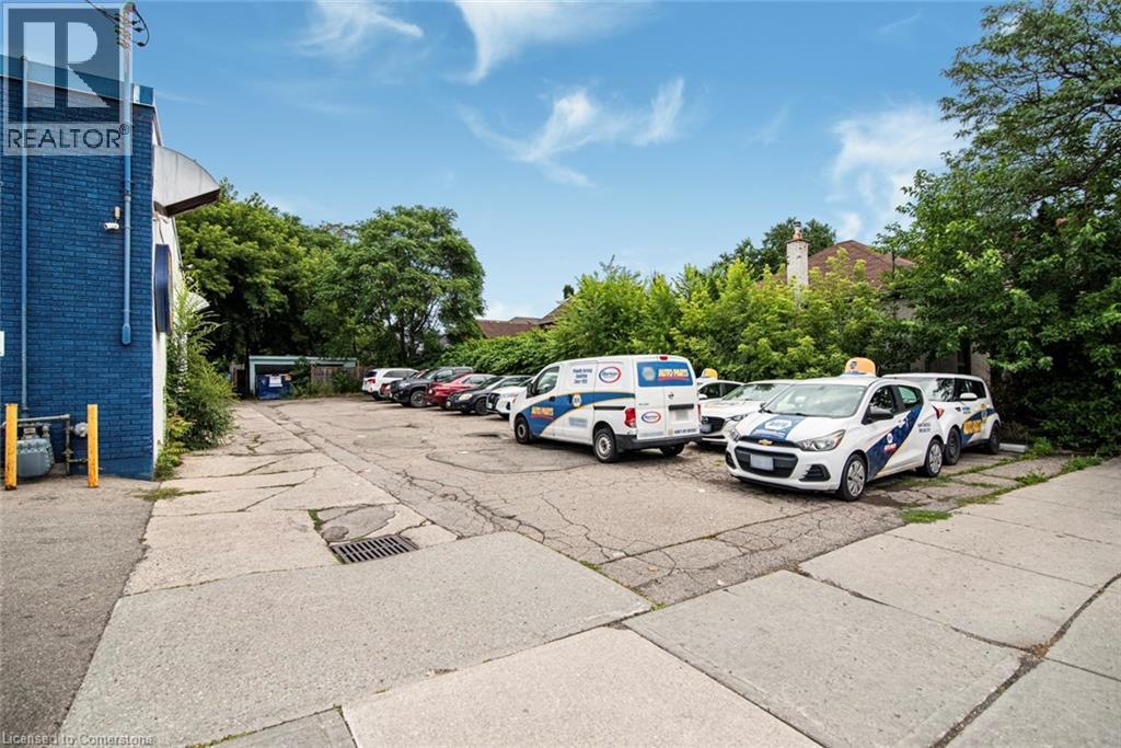 View of uncovered parking lot - 361 Cannon Street E, Hamilton, ON