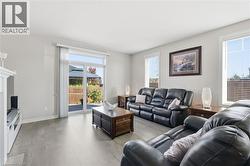 Sliding doors to backyard patio and pergola -