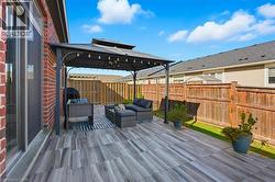 Back deck - tiled with pergola -