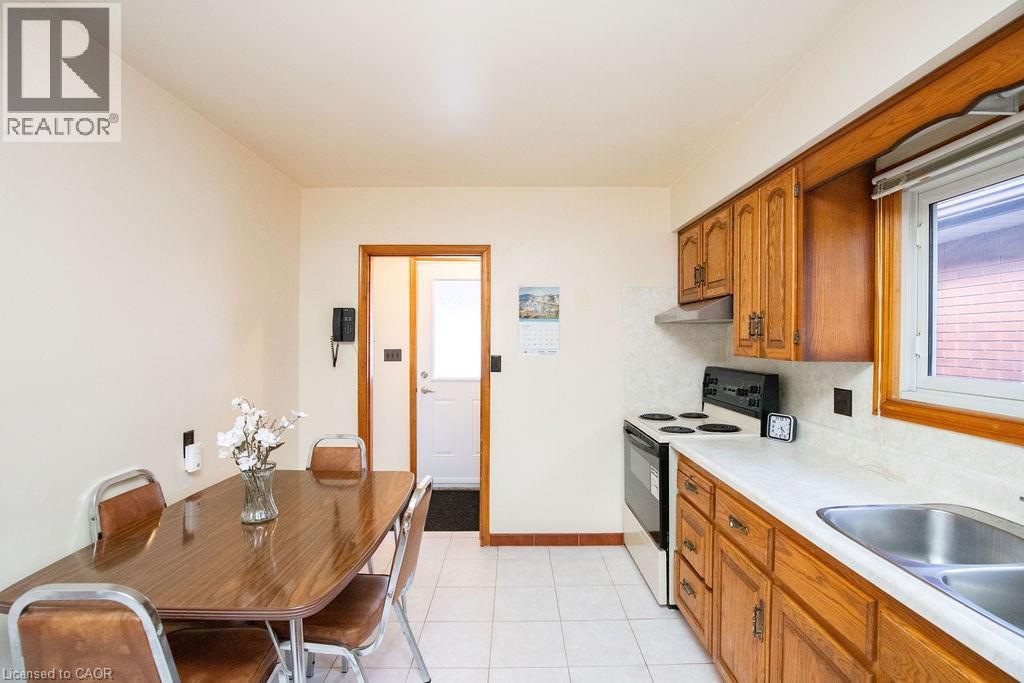 313 Barton Street W, Hamilton, ON - Indoor Photo Showing Kitchen With Double Sink