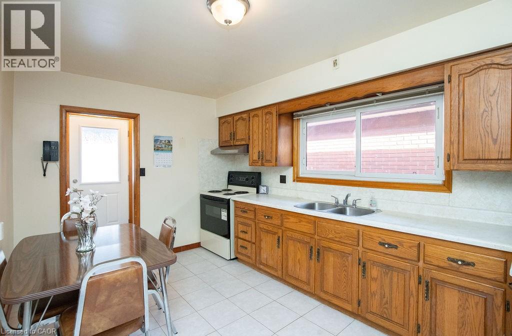 313 Barton Street W, Hamilton, ON - Indoor Photo Showing Kitchen With Double Sink