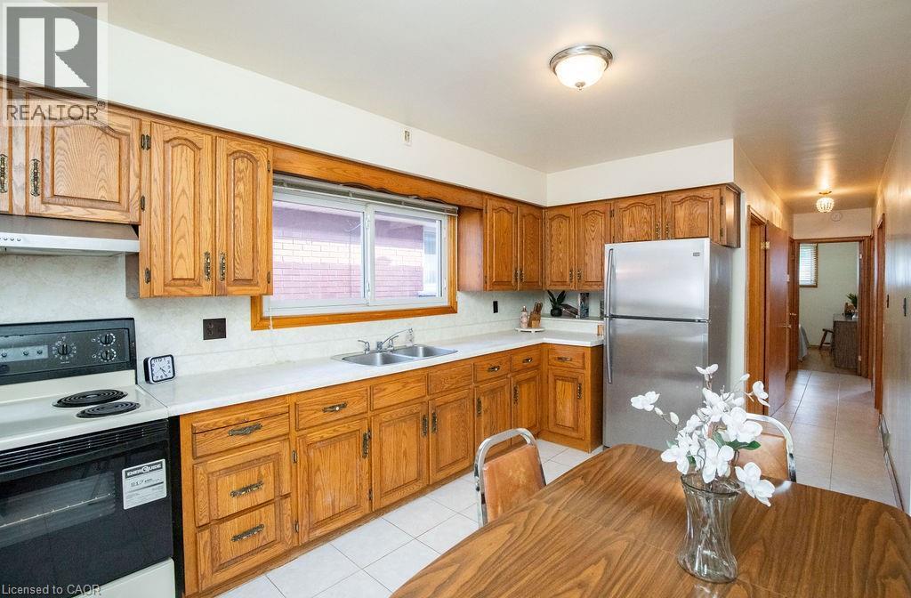 313 Barton Street W, Hamilton, ON - Indoor Photo Showing Kitchen With Double Sink