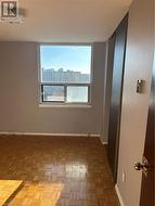 Unfurnished room featuring parquet floors -