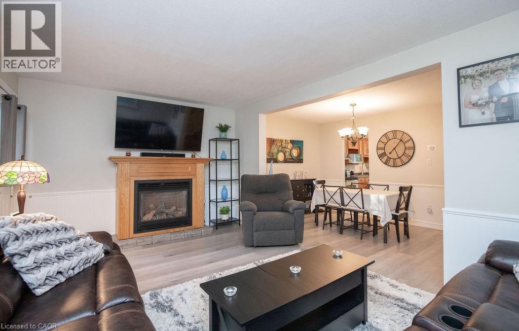 138 Victor Boulevard, Hamilton, ON - Indoor Photo Showing Living Room With Fireplace
