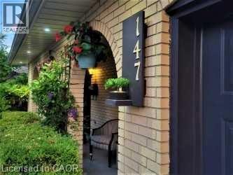 View of property exterior featuring brick siding - 147 Muriel Crescent, London, ON - Outdoor