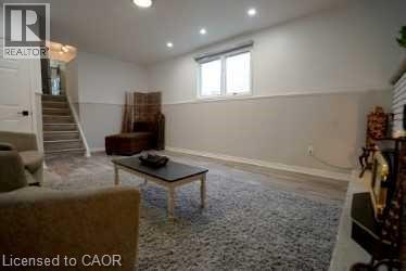 Living area with recessed lighting and stairway - 147 Muriel Crescent, London, ON - Indoor