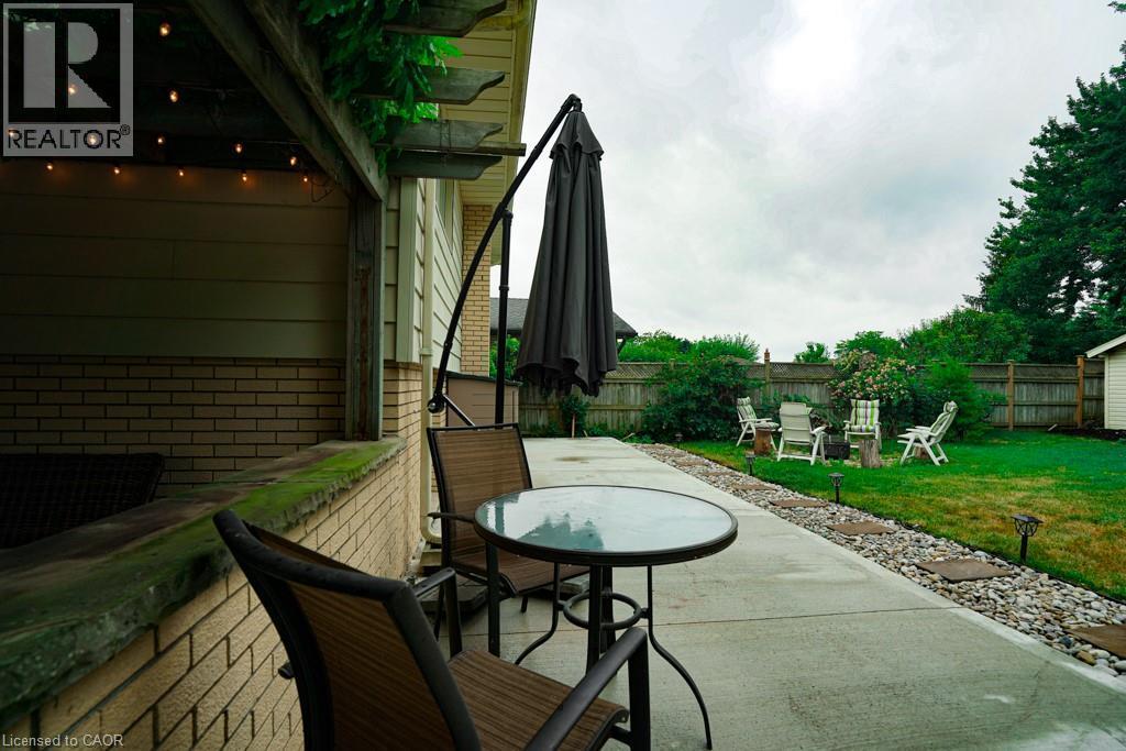 Fenced backyard with a patio area and outdoor dining space - 147 Muriel Crescent, London, ON - Outdoor