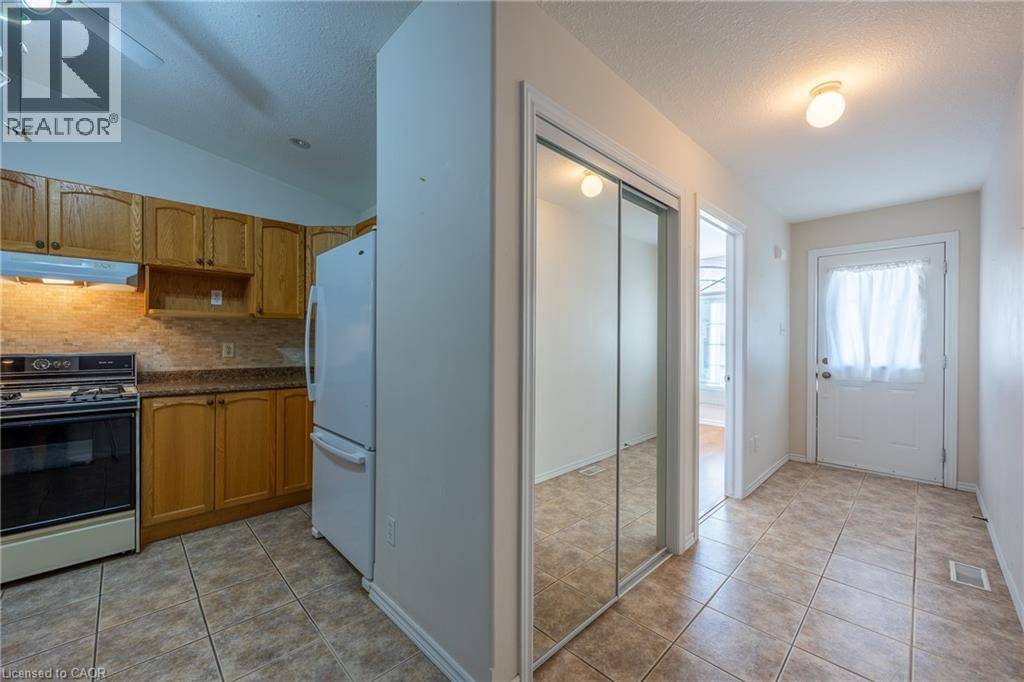 Ceramic tile entryway and kitchen floors. - 510 Queensway W Unit# 5, Simcoe, ON - Indoor Photo Showing Kitchen