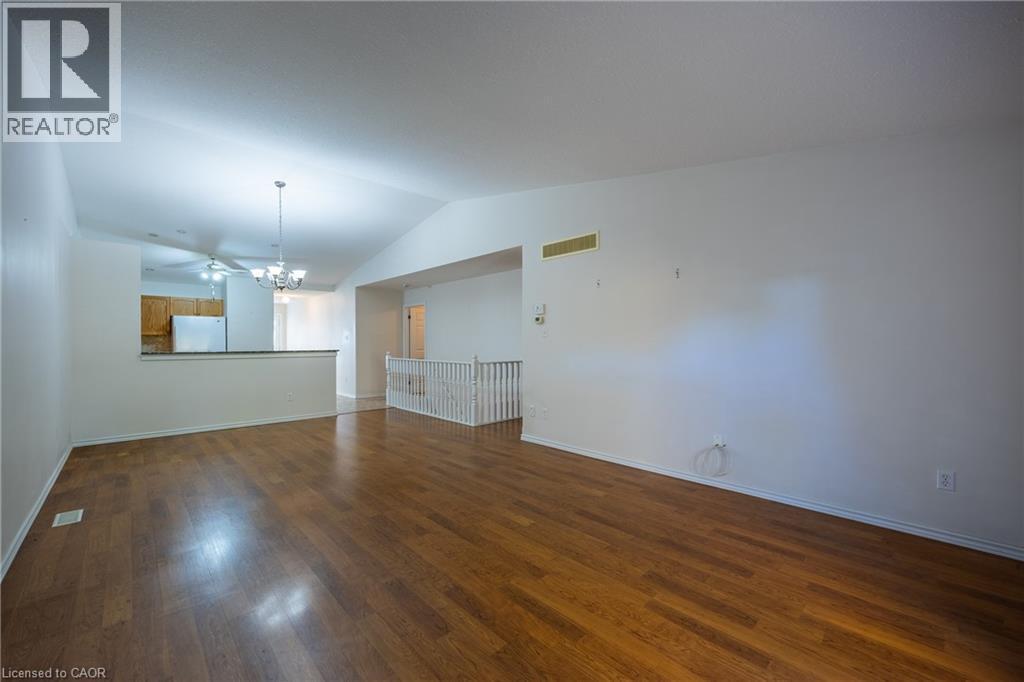 Another view of dining and living rooms. - 510 Queensway W Unit# 5, Simcoe, ON - Indoor Photo Showing Other Room