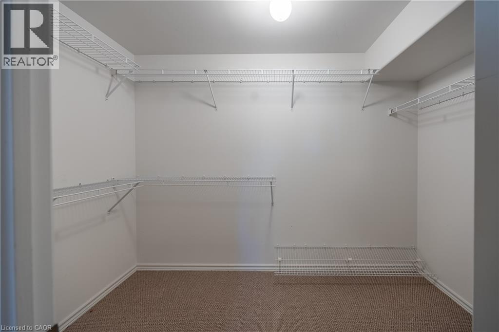 View of walk in storage closet complete with shelving. - 510 Queensway W Unit# 5, Simcoe, ON - Indoor With Storage