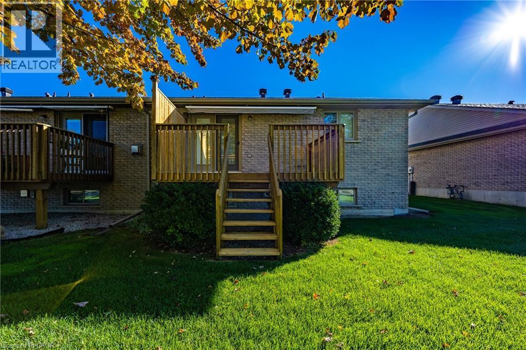 Deck with awning unit. - 510 Queensway W Unit# 5, Simcoe, ON - Outdoor