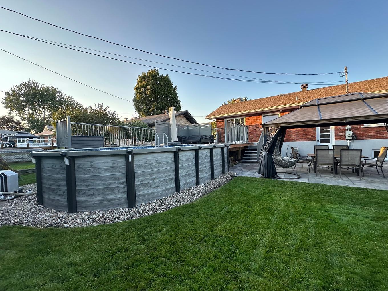 Pool - 440 Rue Kugler, Laval (Duvernay), QC - Outdoor With Above Ground Pool