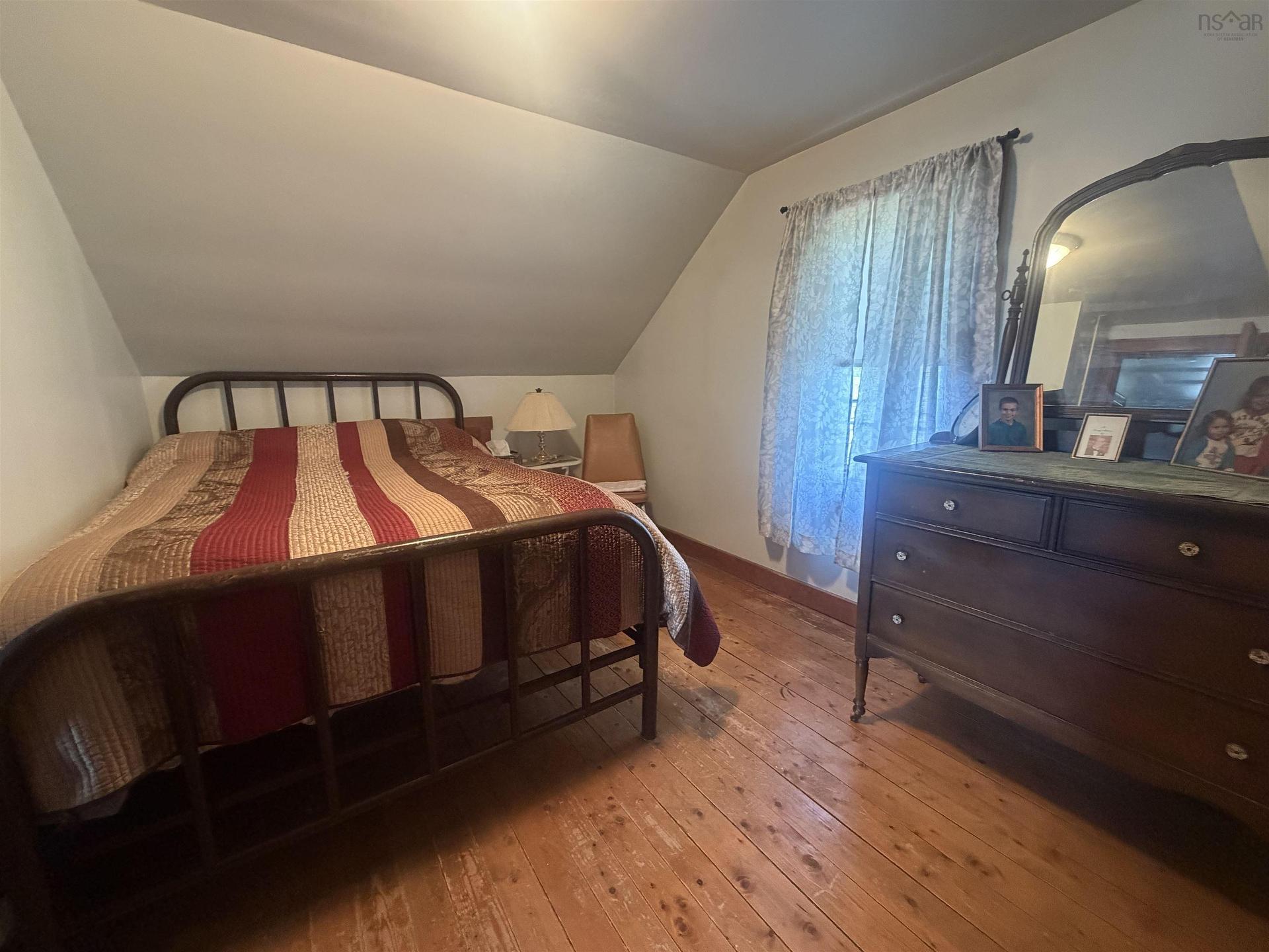 9596 105 Highway, Whycocomagh, NS - Indoor Photo Showing Bedroom