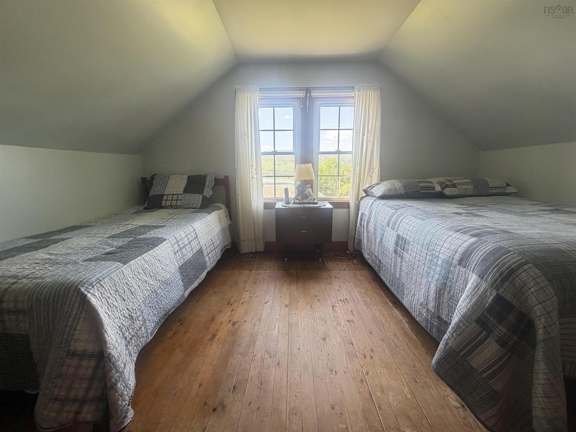9596 105 Highway, Whycocomagh, NS - Indoor Photo Showing Bedroom